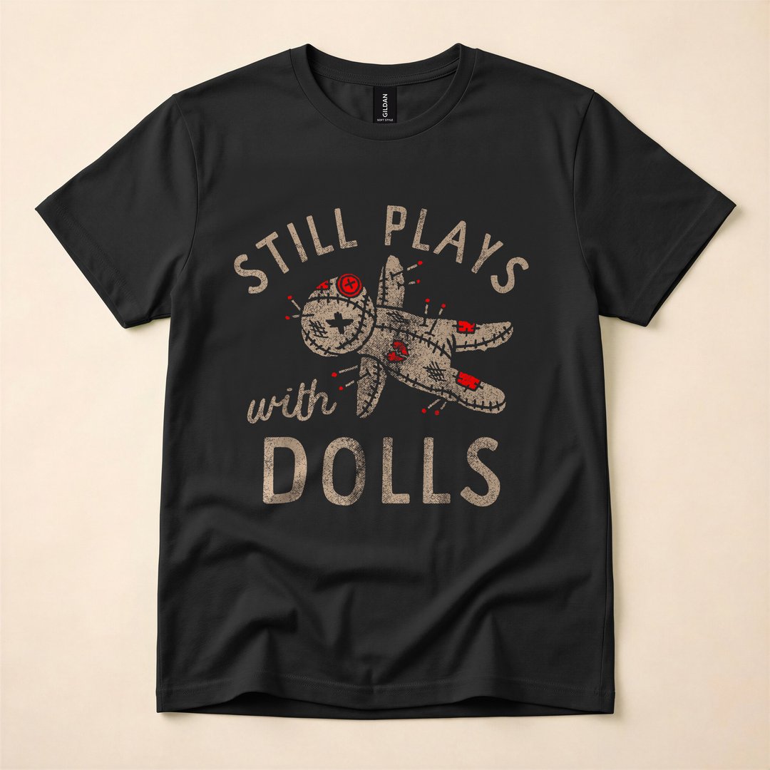Still Plays With Dolls Creepy Doll Horror Humor T-Shirt
