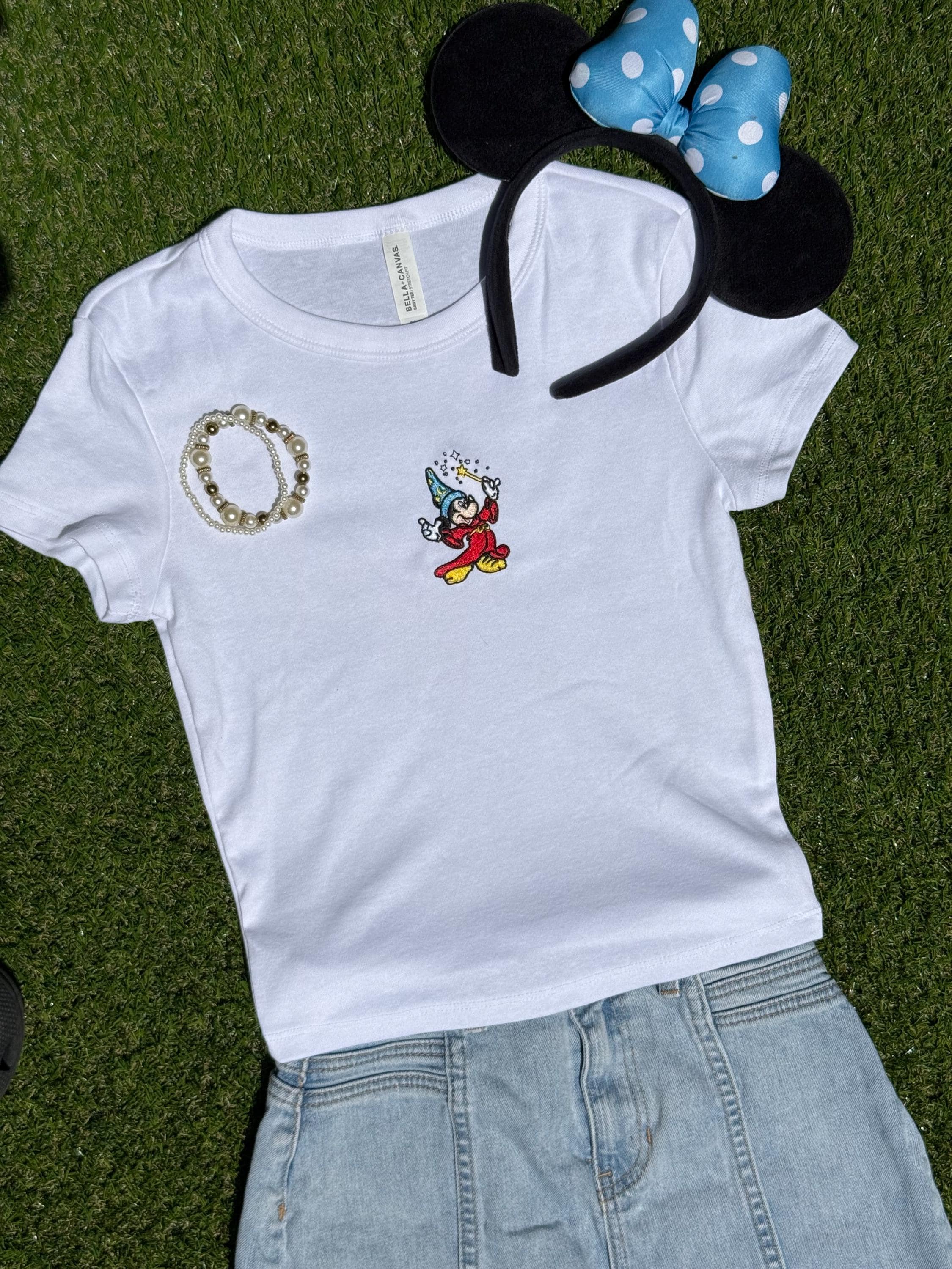 Sorcerer Mickey Embroidered Baby Tee – Fitted Crop Style Shirt with Magical Wizard Hat Design for Everyday Wear