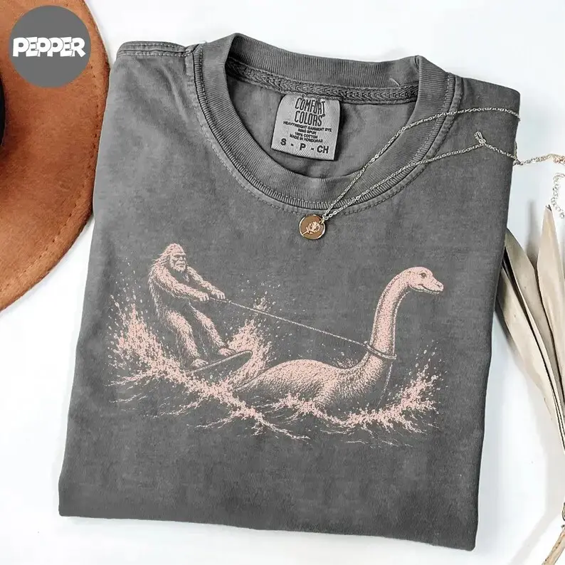 Comfort Colors Funny Bigfoot Loch Ness Monster Shirt, Cryptid Waterskiing Sasquatch Summer Graphic Tee