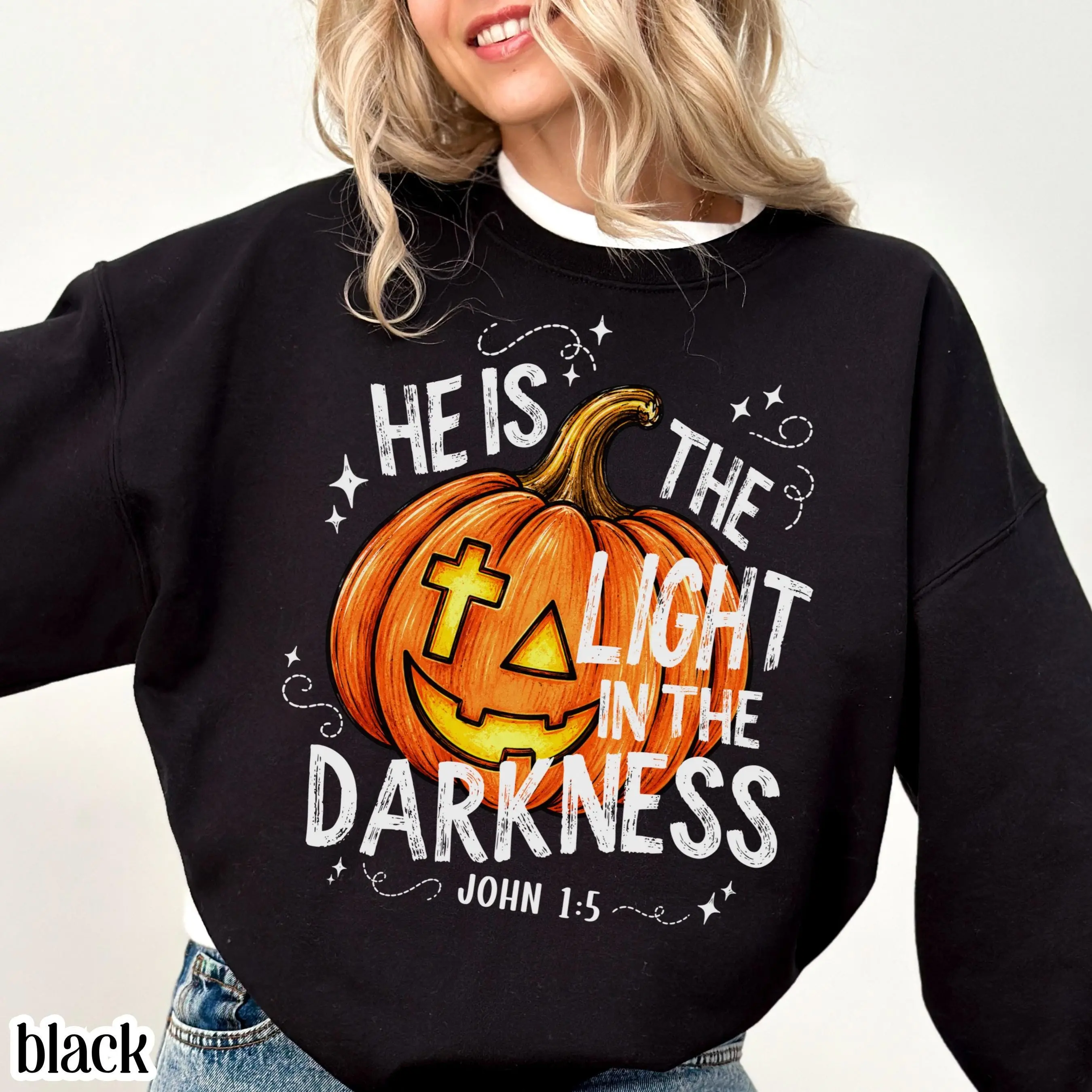He Is The Light In The Darkness Christian Halloween Sweatshirt, John 1:5 Faith Pumpkin Fall Bible Verse Crewneck - photo 4