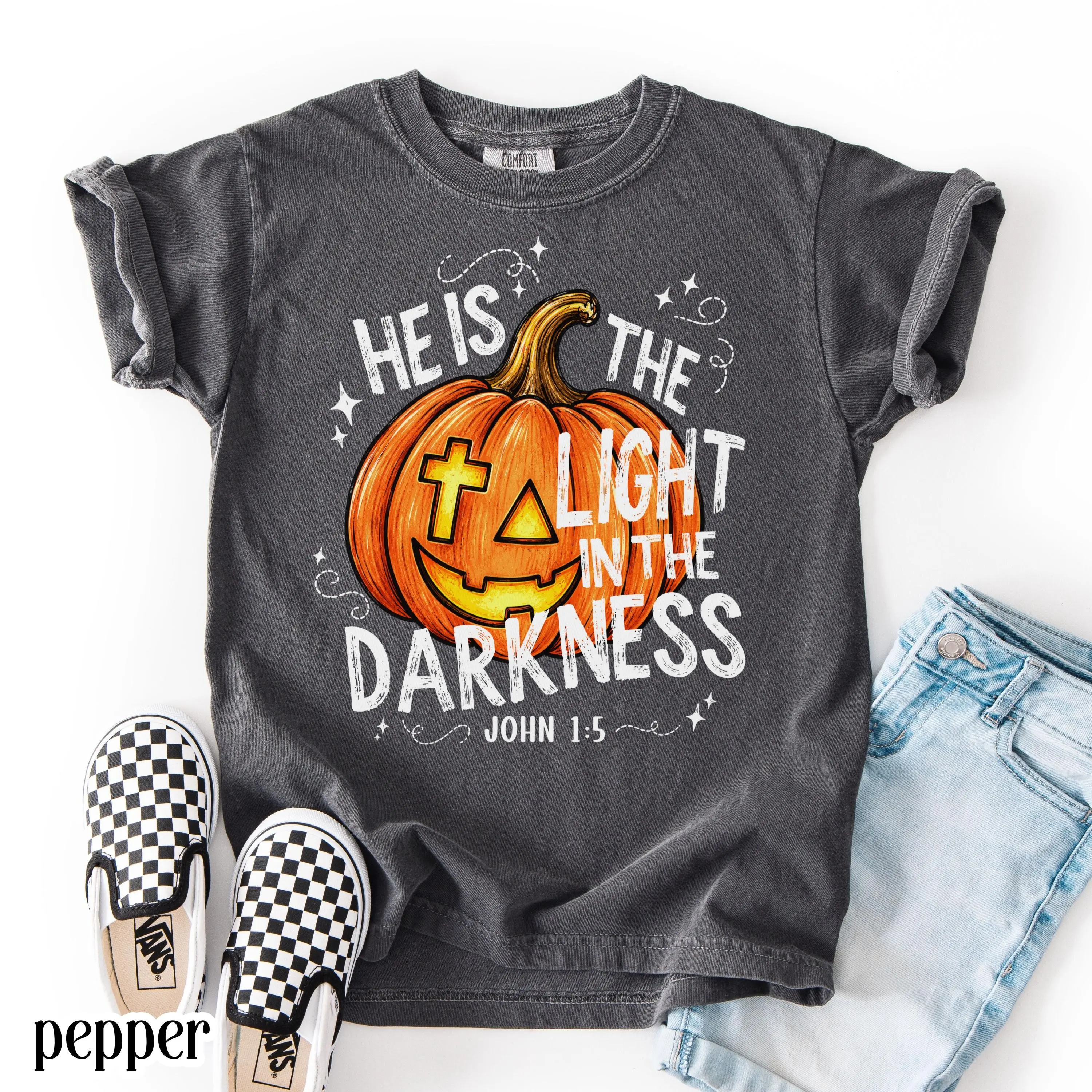 Comfort Colors He Is The Light In The Darkness Shirt, Christian Halloween John 1:5 Faith Pumpkin Youth Kids Tee